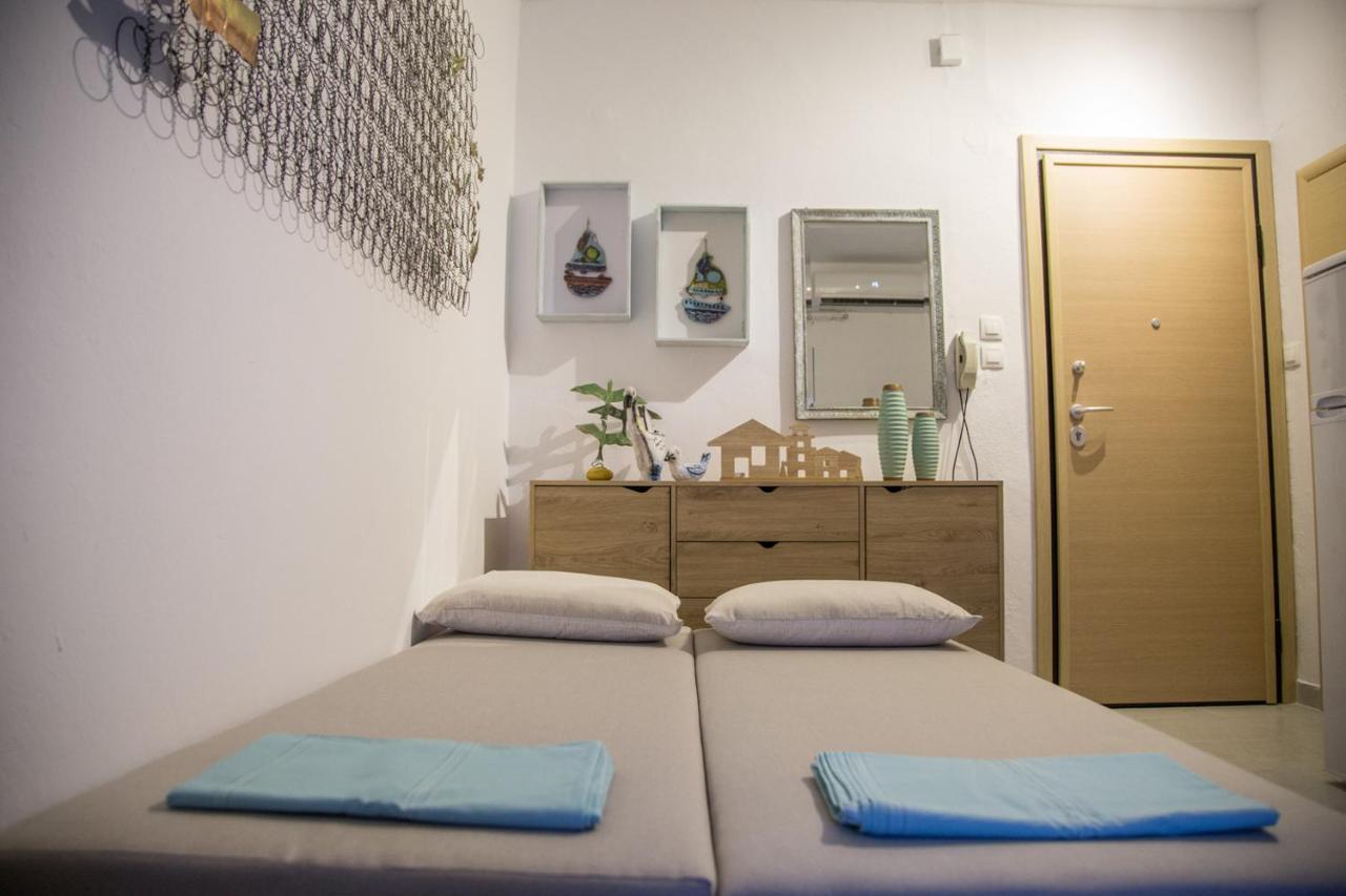 Grey Theros Apartments Paralia Dionysiou Esterno foto
