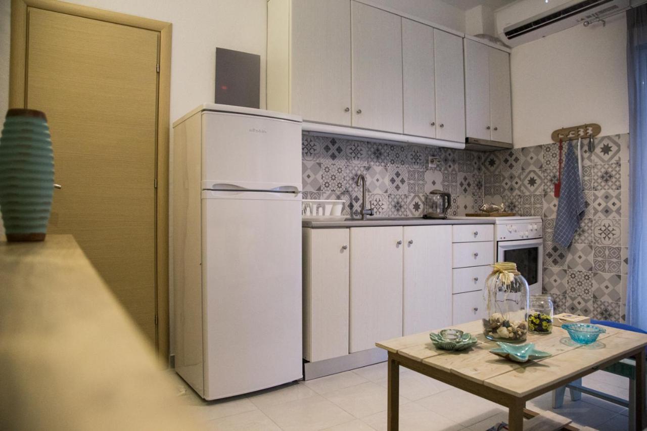 Grey Theros Apartments Paralia Dionysiou Esterno foto